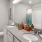 Double vanity bathroom with modern lighting