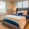 Bedroom with natural lighting and high ceilings