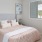 Bedroom with natural lighting and high ceilings