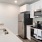 Well-lit kitchen with ample counter space