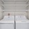 Laundry area with ample shelving