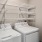 Laundry room with ample shelves